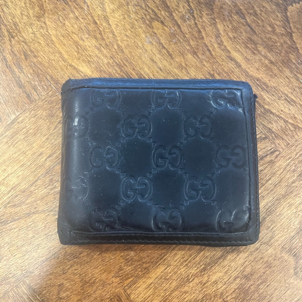 Gucci Black Leather Wallet with Embossed Logo